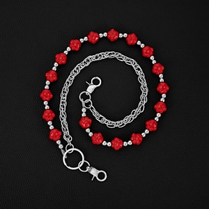 Detail showing red bear paw beads and silver metal chain with lobster clasps