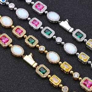 Bracelets de luxe en or et argent avec pierres précieuses colorées et opales fines