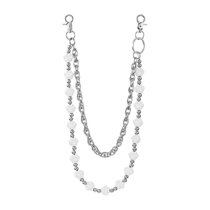 Close-up of double-layer chain featuring white cat paw charms and metal lobster clasps