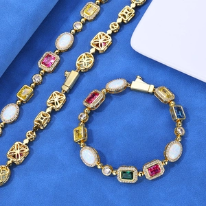 Macro shot of colorful gemstone jewelry set with gold plating and ornate metalwork