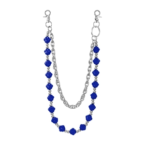 Detail of a double-layered punk style chain with bright blue flower charms and metal clasps