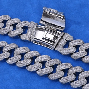 Close-up of 29mm iced out Cuban link chain with pave zircons and wide box clasp