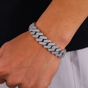 Close-up of 16mm iced-out Cuban link bracelet with triple-row diamonds on wrist