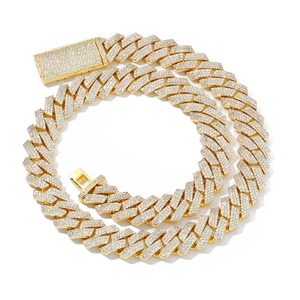 Detail of gold Cuban chain with three-row pavé-set moissanite diamonds and secure box clasp