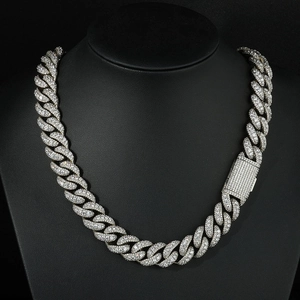 Macro view of iced out S925 sterling silver Cuban link necklace with Moissanite stones