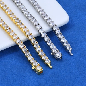 Hypoallergenic iced-out tennis chains in gold and silver plating with cubic zirconia