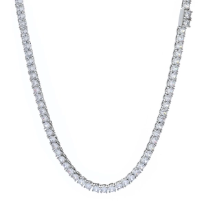 Detailed macro view of silver tennis chain necklace with round cut cubic zirconia stones