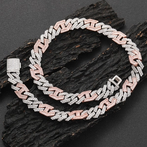 Close-up of hip hop cuban chain with two-tone silver and rose gold zircon inlaid links