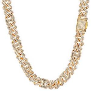 Detail of 15mm gold Cuban chain with iced out zircon pavé and geometric diamond links