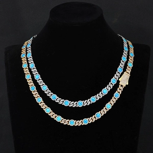 Luxurious Cuban link necklaces in gold and silver finish with blue opal stones and micro-pave diamonds