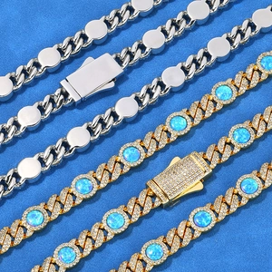 Iced out Cuban link necklace in silver and gold with blue opal stones and crystals