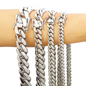 Polished Cuban link chains in five different widths with secure double-safety clasps