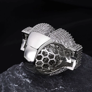 Silver hip hop ring with pavé-set zircons and a honeycomb gallery structure
