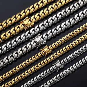 Polished gold and silver Cuban link chains with secure box clasp in various widths