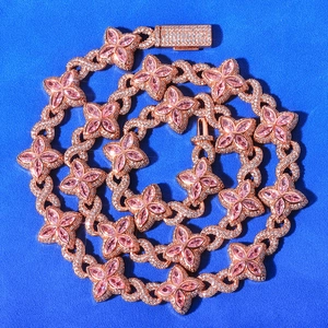 Close-up of rose gold Cuban necklace with pink clover petals and micro-pave cubic zirconia