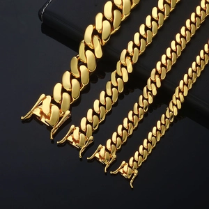 Polished gold Cuban link chains in four widths with secure clasp for men’s hip hop style