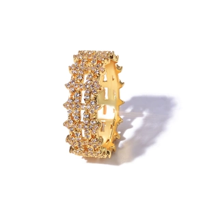Detail of 8mm gold hollow ring with pave-set sparkling zircons in a hip hop style