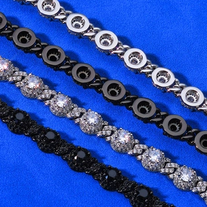 Detail view of four 7.5mm hip hop Cuban link bracelets with zircon pavé in various finishes