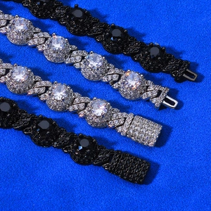 Macro view of iced out 7.5mm Cuban chain bracelets with zircon studs in silver and black