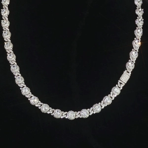Close-up of 7.5mm hip hop Cuban link chain with round zircon insets and secure box clasp