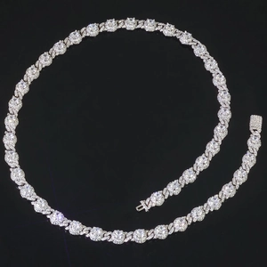 Macro detail of silver iced out Cuban chain with 7.5mm zircon cluster crystals