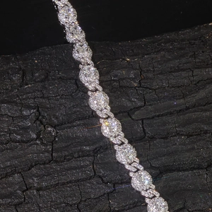 Macro detail of 7.5mm hip hop Cuban link chain featuring premium round zircon pave setting