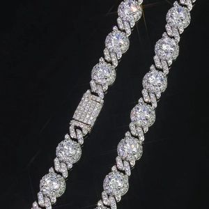 Macro shot of 7.5mm iced-out Cuban chain with pavé-set round zircons and S-shaped links