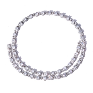 Detailed close-up of 7.5mm iced out cuban link chain with pavé set cubic zirconia stones