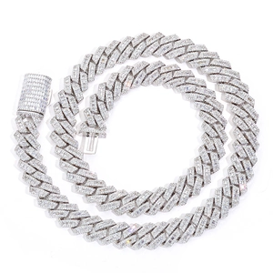 Detailed view of silver Cuban chain with dense zircon paving and secure box clasp closure