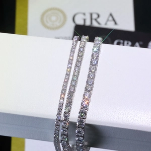 Close-up of S925 silver moissanite tennis bracelets in three sizes with GRA report