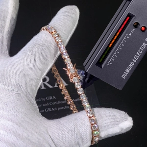 Rose gold moissanite tennis bracelet tested with a diamond selector and GRA certificate