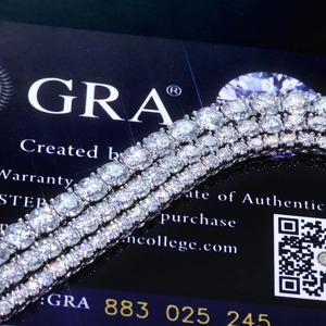 Macro detail of S925 sterling silver moissanite tennis bracelet with GRA certificate card