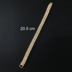 Detail of 20.5cm gold double row rhinestone tennis bracelet with secure metal clasp