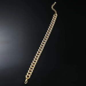 Bracelet de cheville gourmette dorée avec cristaux brillants et fermoir mousqueton solide