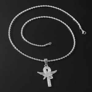 Detail of silver Ankh cross pendant with Horus eye and wings on twist rope chain