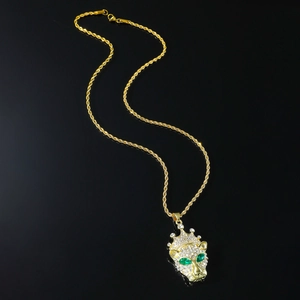 Hip-hop gold rope chain necklace featuring a leopard head pendant with green gem eyes