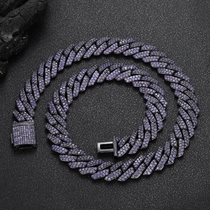 Macro shot of 15mm gunmetal Cuban link chain with purple pavé-set cubic zirconia stones