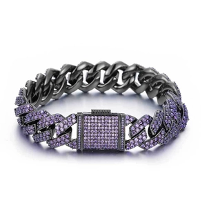 Macro detail of gunmetal cuban link bracelet with pave-set purple zircon stones