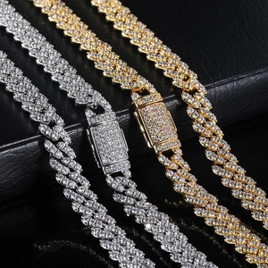Hip hop style Cuban link chain in gold and silver with shimmering paved zircon stones