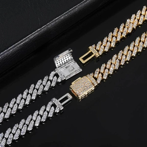 Macro detail of high-quality iced out 8mm Cuban link chain with a secure diamond clasp closure