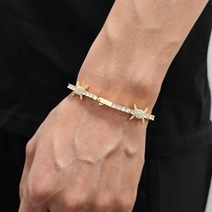 Hip-hop gold plated thorn tennis bracelet with white cubic zirconia on male wrist