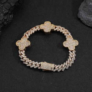 Bracciale hip-hop a catena cubana dorata con quadrifogli ghiacciati e zirconi