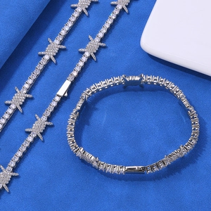 Detailed macro view of silver hip hop tennis bracelet with barbed wire zircon studs