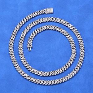 Macro shot of silver 6mm Cuban link chain with encrusted cubic zirconia and secure clasp