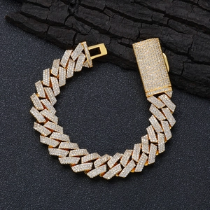 Detail of 16mm iced-out cuban link bracelet with white zircons on premium black leather