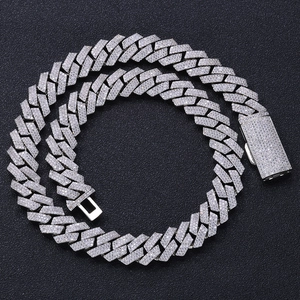 Detailed close-up of 16mm silver cuban link chain with iced out pavé set zircons