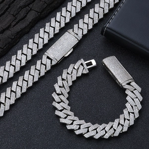 Close-up of 16mm iced out silver Cuban link chain jewelry set with rhinestones