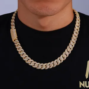 Detail of 13mm iced out Cuban link chain with double-row cubic zirconia on male model