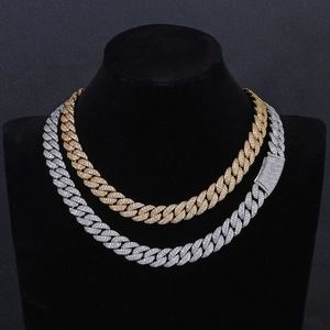 Detail of 13mm double row zircon Cuban link chains in gold and silver with iced out buckle