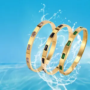 18K gold plated titanium steel bangle with inlaid rectangular zircon stones